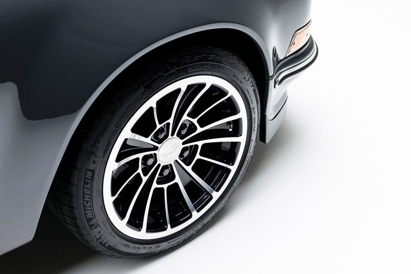 Close-up of a Triebwerk F3.6 wheel with a detailed rim design on a white background