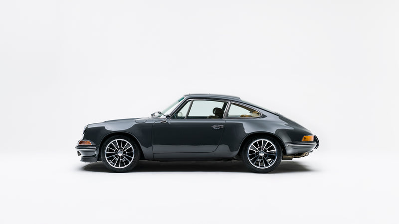 Side view of a gray Triebwerk F3.6 on a white background