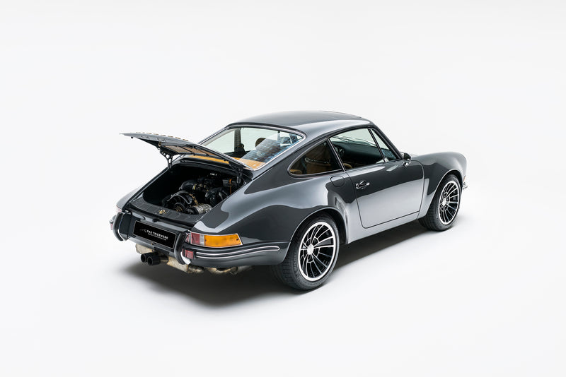 Gray Triebwerk F3.6 with open engine cover on a white background