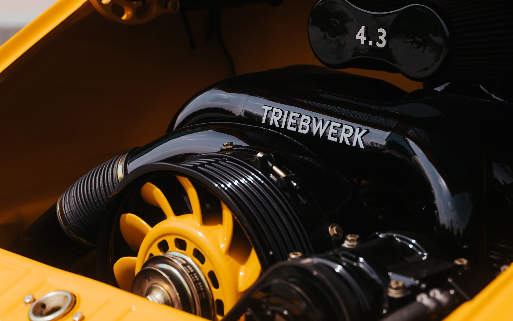 Close-up of a Triebwerk F4.3 engine with visible branding and components.
