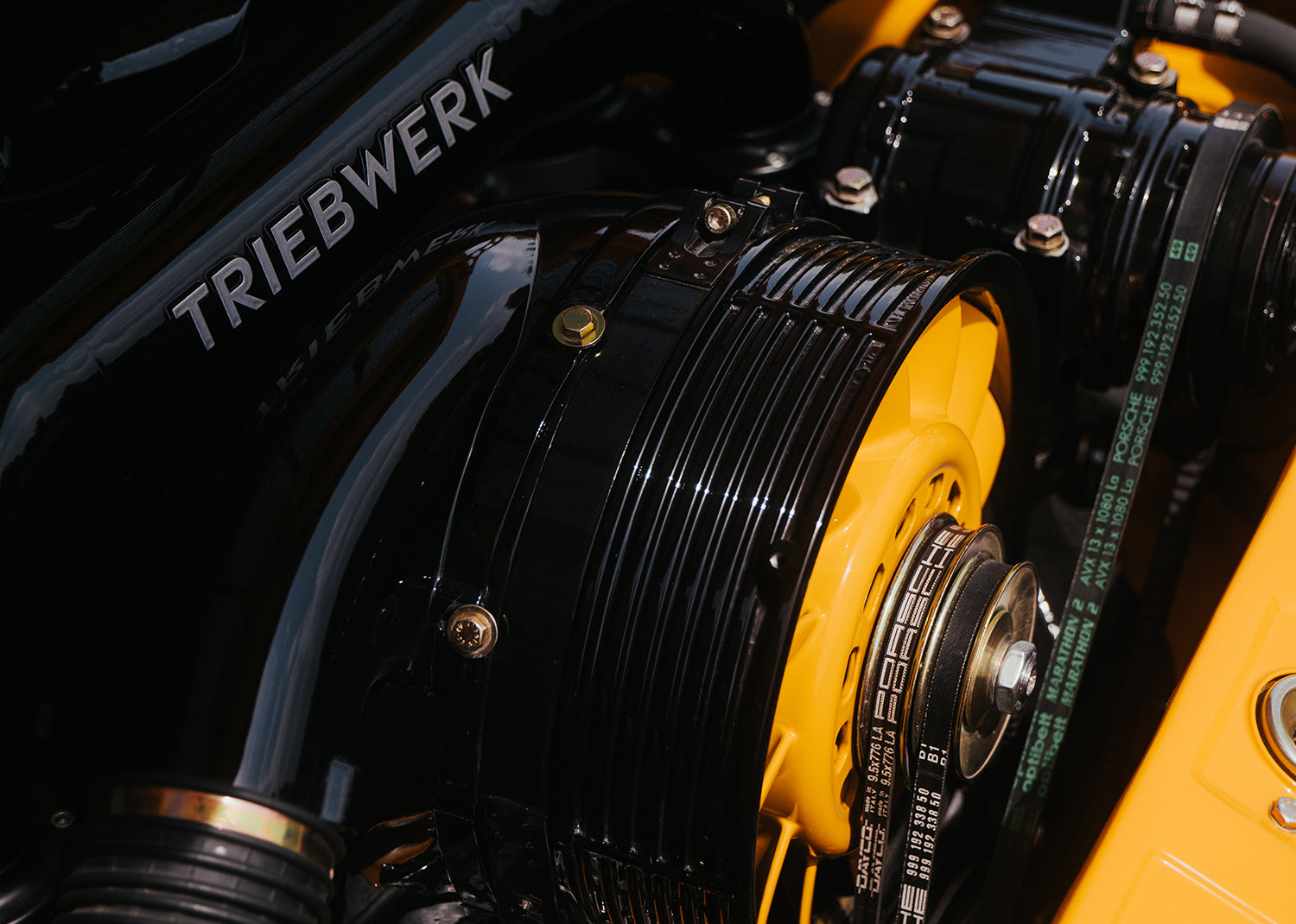 Close-up of a Triebwerk F4.3 engine with yellow and black components.